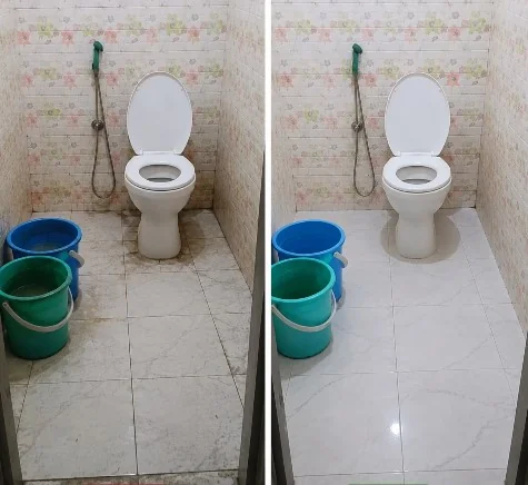 Clean bathroom with white tiles and glass shower enclosure after professional treatment